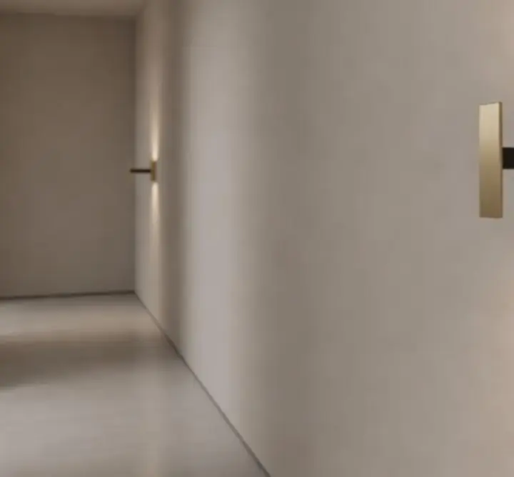 Minimalistyczny kinkiet na eleganckiej ścianie